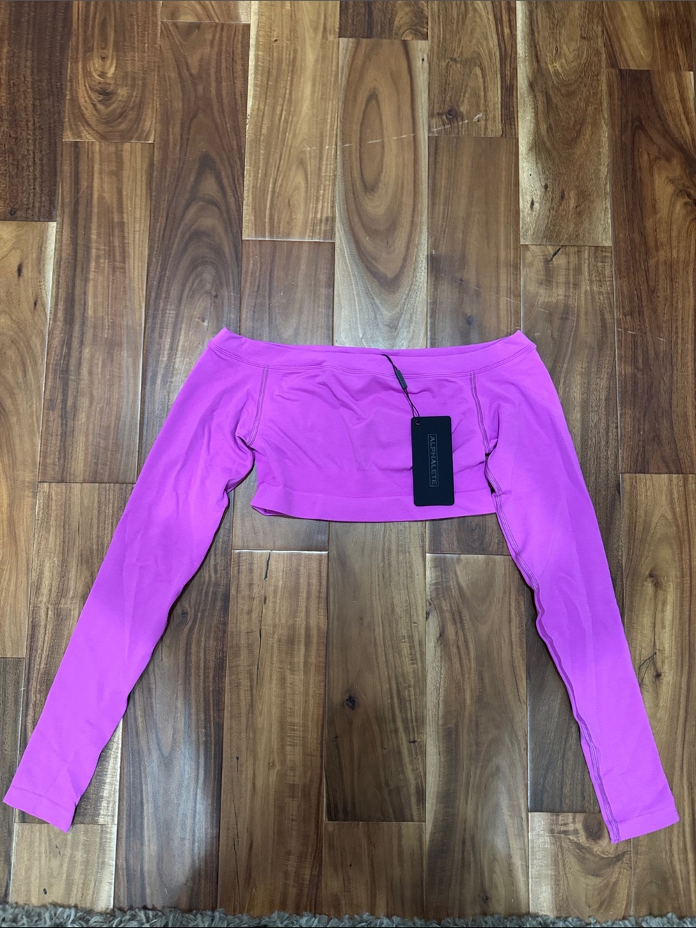 Alphalete Long Sleeve Cropped Tee in Bright Pink